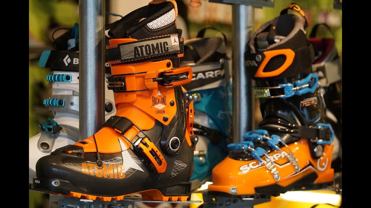 Can I fit ski boots on my own, or should I seek professional help?